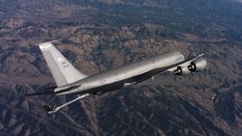 4K stock footage aerial video of a Boeing KC-135 lowering refueling boom above Northern California Aerial Stock Footage | WAAF04_C038_01186H