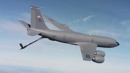 4K stock footage aerial video of a Boeing KC-135 raising fuel boom in flight over Northern California Aerial Stock Footage | WAAF04_C039_0118J9