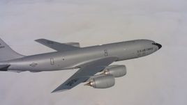4K stock footage aerial video of tracking a Boeing KC-135 flying over low clouds in Northern California Aerial Stock Footage | WAAF04_C081_01189U