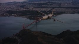 4K stock footage aerial video of a Lockheed Martin C-130J flying over the Marin Hills at sunset near San Francisco, California Aerial Stock Footage | WAAF06_C085_0119X1_S000