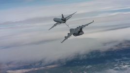 4K stock footage aerial video of following a McDonnell Douglas KC-10 refueling a Boeing C-17, Northern California Aerial Stock Footage | WAAF07_C040_0119WE