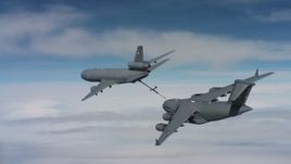 4K stock footage aerial video of a McDonnell Douglas KC-10 finished refueling a Boeing C-17 in Norther California Aerial Stock Footage | WAAF07_C040_0119WE_S000