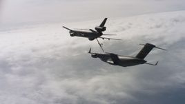 4K stock footage aerial video of a view of a McDonnell Douglas KC-10 refueling a Boeing C-17 over Northern California Aerial Stock Footage | WAAF07_C042_0119DR