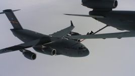 4K aerial stock footage video a McDonnell Douglas KC-10 fueling a Boeing C-17 over Northern California Aerial Stock Footage | WAAF07_C049_0119K9