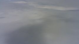 4K stock footage aerial video of a reverse view of cloud layers above Northern California  Aerial Stock Footage | WAAF07_C075_0119LB