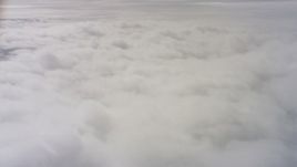 4K stock footage aerial video of flying over a layer of clouds over Northern California Aerial Stock Footage | WAAF07_C077_01191U