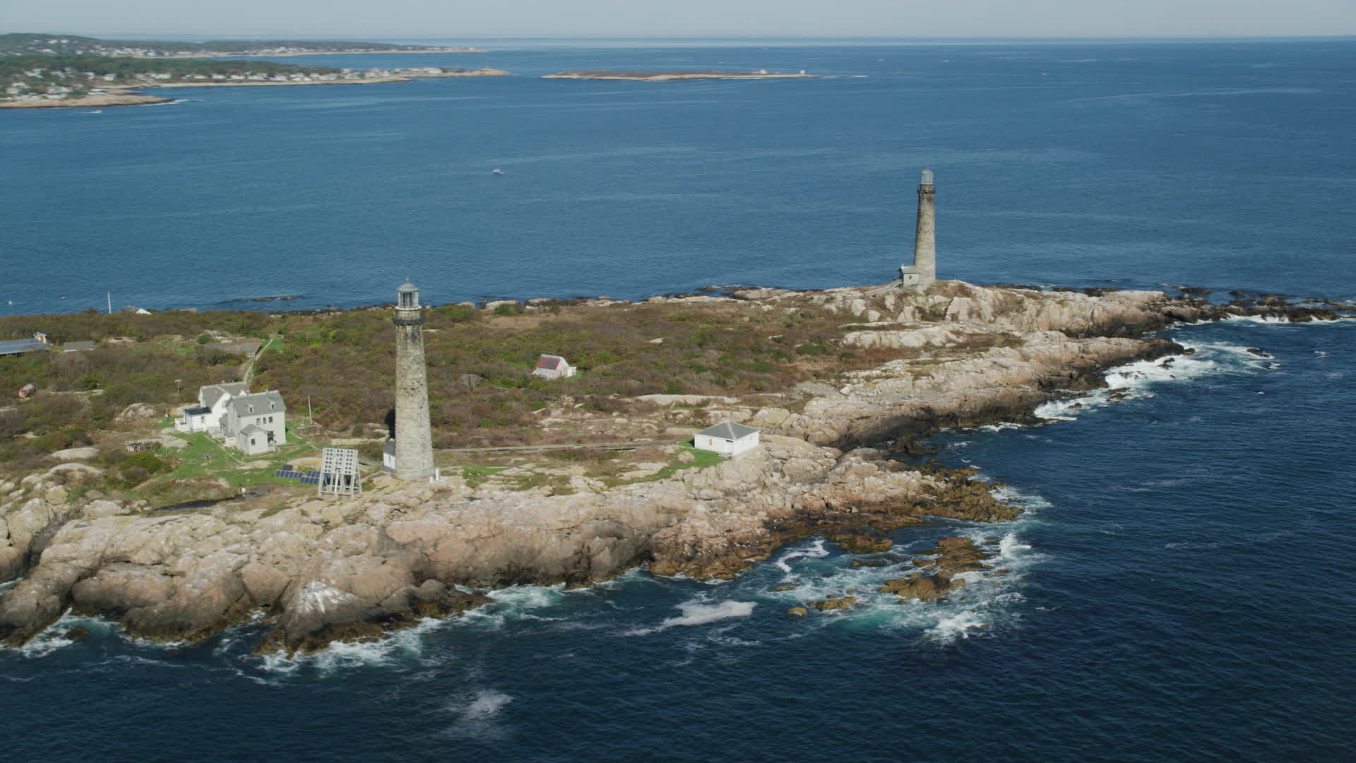 6k stock footage aerial video orbiting two lighthouses on Thatcher ...