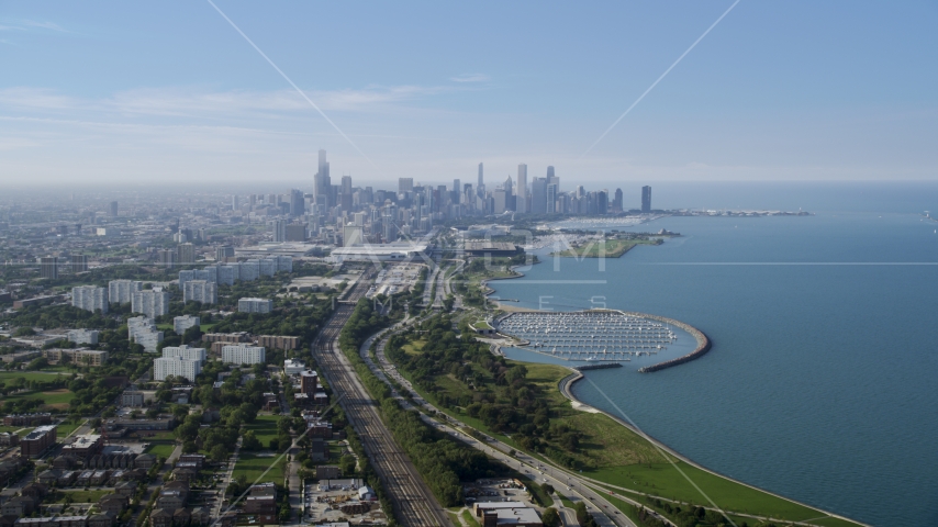 The Downtown Chicago skyline in the distance, Illinois Aerial Stock Photo AX0001_013.0000472F | Axiom Images