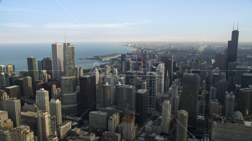 Downtown Chicago skyscrapers on a hazy day, Illinois Aerial Stock Photo AX0001_032.0000034F | Axiom Images
