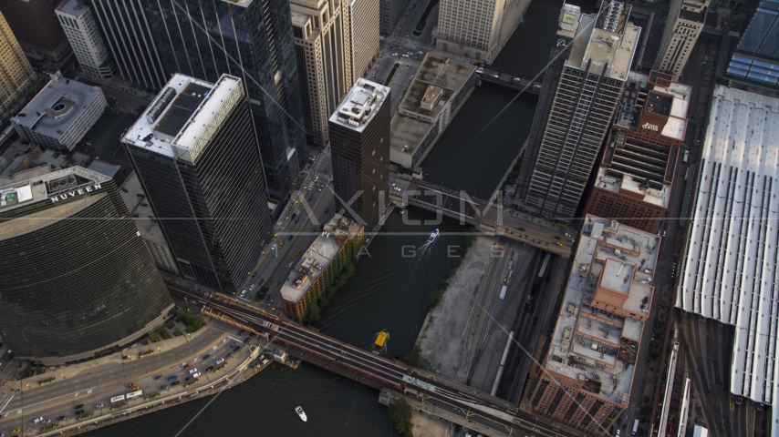 A bird's eye of Chicago River and bridges in Downtown Chicago, Illinois Aerial Stock Photo AX0001_034.0000096F | Axiom Images