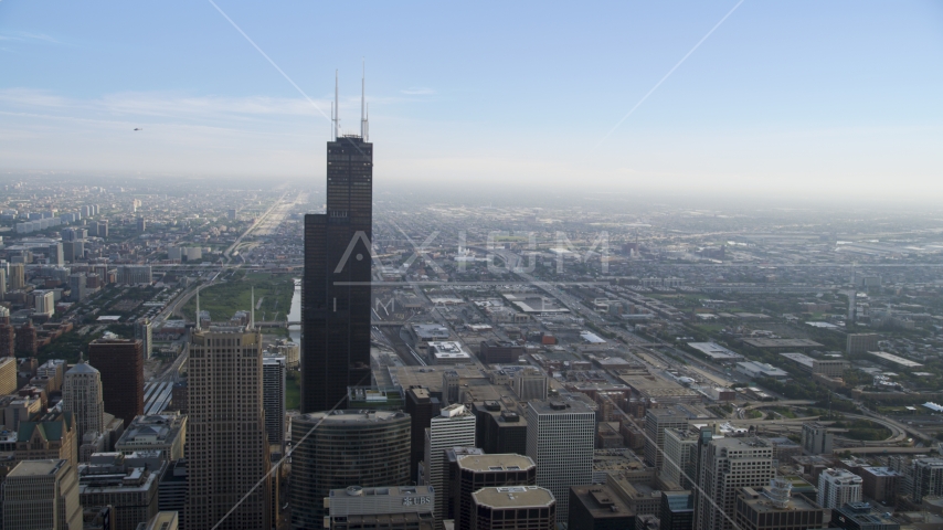 Willis Tower and city sprawl, Downtown Chicago, Illinois Aerial Stock Photo AX0001_034.0000351F | Axiom Images