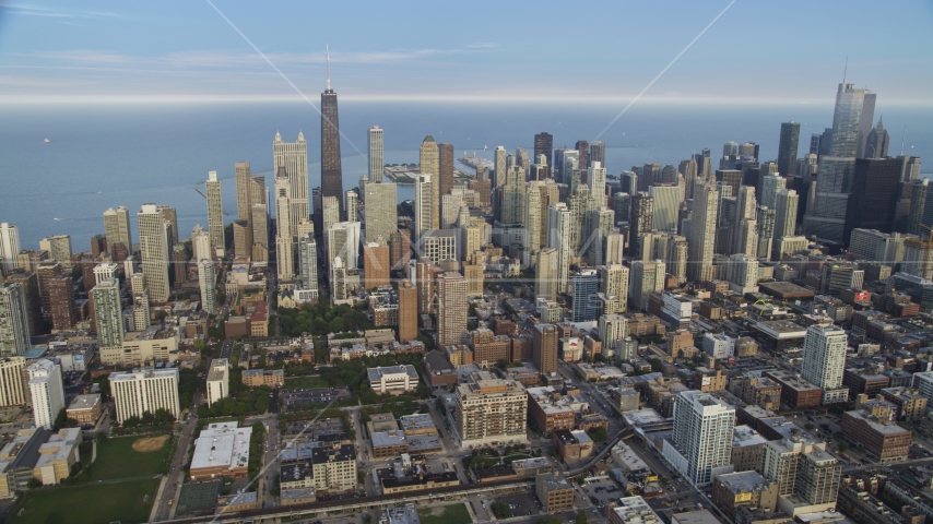 Downtown Chicago skyscrapers on a cloudy day, Illinois Aerial Stock Photo AX0001_056.0000342F | Axiom Images