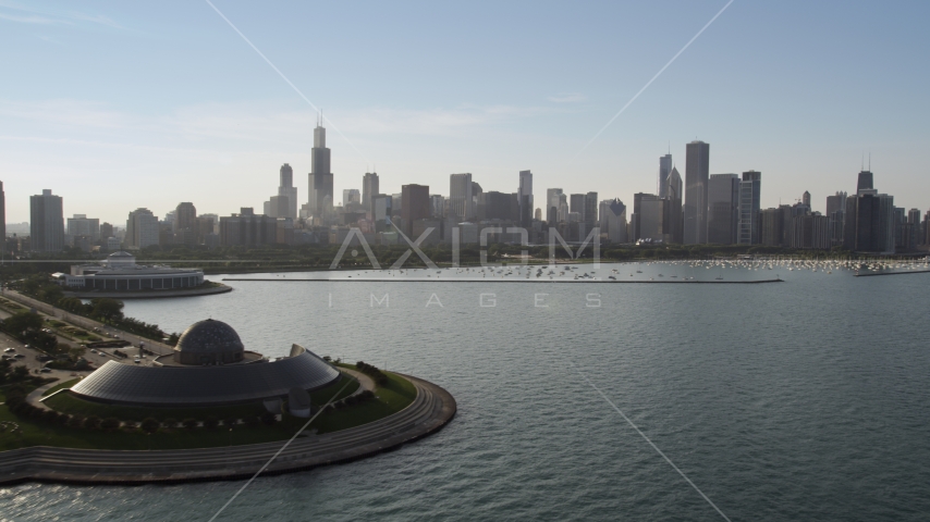 The downtown skyline and harbor seen from Adler Planetarium, Downtown Chicago, Illinois Aerial Stock Photo AX0001_100.0000050F | Axiom Images