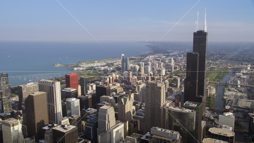 Willis Tower and Lake Michigan in the background, Downtown Chicago, Illinois Aerial Stock Photo AX0001_108.0000249F | Axiom Images