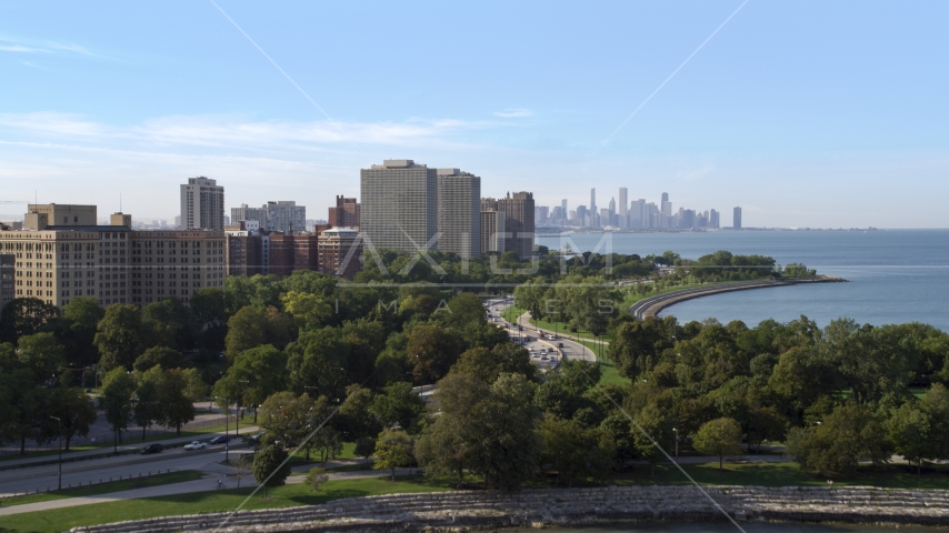 Hyde Park apartment buildings, and the Downtown Chicago skyline, Illinois Aerial Stock Photo AX0002_003.0000257F | Axiom Images
