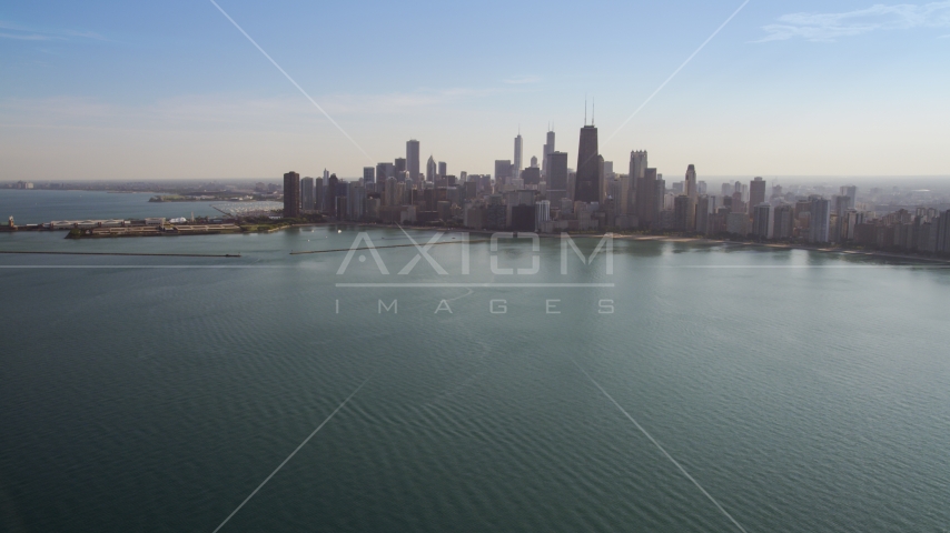 The Downtown Chicago skyline, seen from Lake Michigan, Illinois Aerial Stock Photo AX0002_018.0000304F | Axiom Images