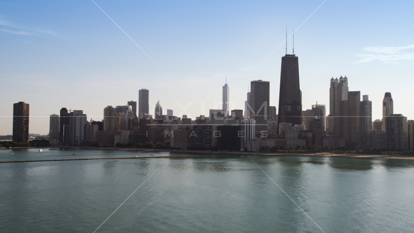 A view of the city's skyline from Lake Michigan, Downtown Chicago, Illinois Aerial Stock Photo AX0002_020.0000312F | Axiom Images