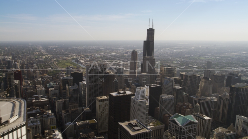 A view of Willis Tower from across Downtown Chicago, Illinois Aerial Stock Photo AX0002_027.0000419F | Axiom Images