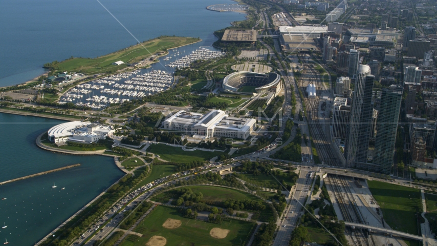 The Shedd Aquarium, Field Museum of Natural History, and Soldier Field, Chicago, Illinois Aerial Stock Photo AX0002_081.0000015F | Axiom Images