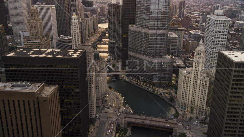 The Chicago River and the base of Trump Tower at sunset, Downtown Chicago, Illinois Aerial Stock Photo AX0003_037.0000286F | Axiom Images