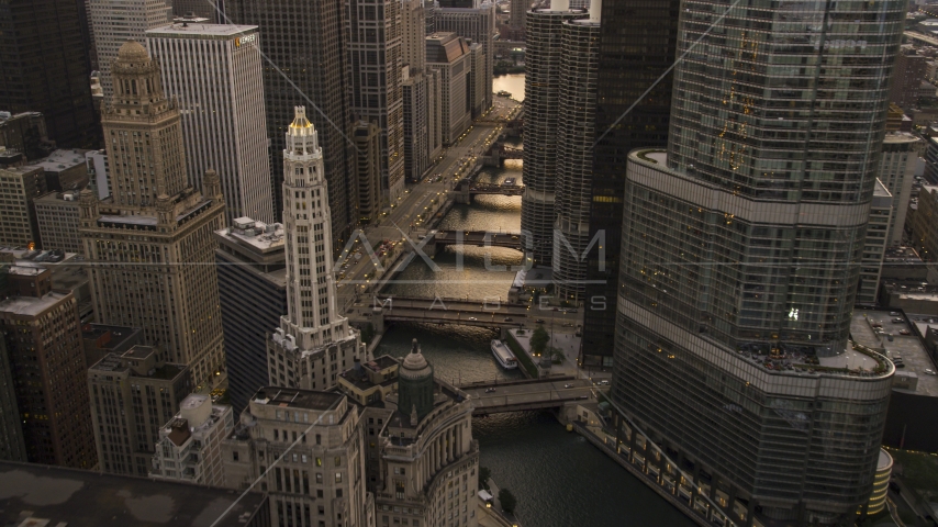 The Chicago River between Mather Tower and Trump Tower at sunset, Downtown Chicago, Illinois Aerial Stock Photo AX0003_038.0000097F | Axiom Images