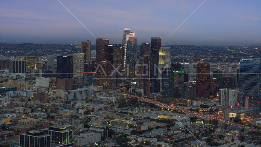 Downtown Los Angeles skyline with new skyscraper, Wilshire Grand Center, twilight, California Aerial Stock Photo AX0158_044.0000179 | Axiom Images