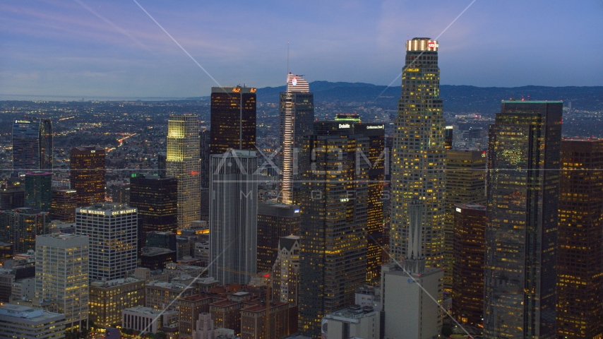 A group of skyscrapers at twilight in Downtown Los Angeles, California Aerial Stock Photo AX0158_048.0000259 | Axiom Images