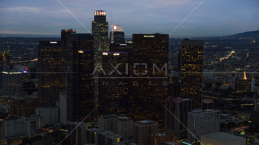 Skyscrapers at twilight in Downtown Los Angeles, California Aerial Stock Photo AX0158_049.0000209 | Axiom Images
