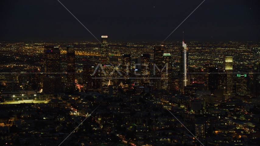 The Downtown Los Angeles skyline at night, California Aerial Stock Photo AX0158_073.0000309 | Axiom Images