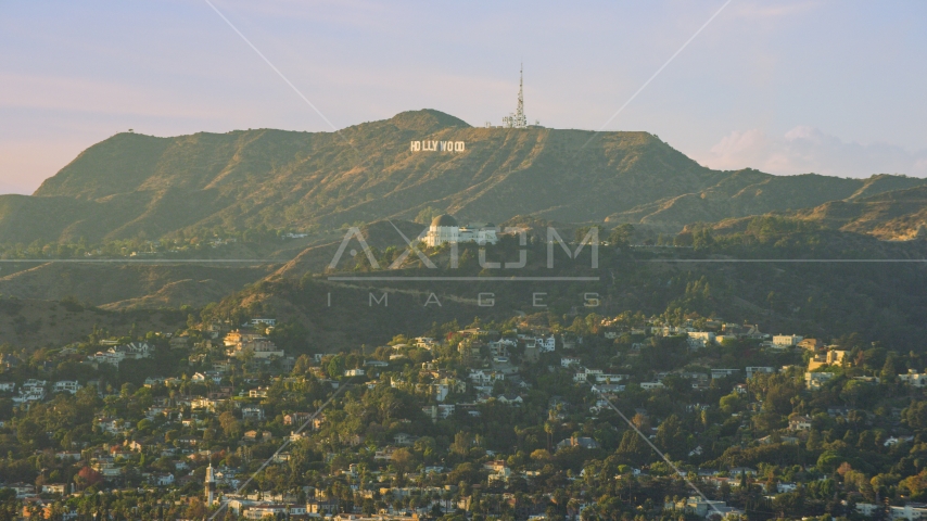 The Hollywood Sign behind Griffith Observatory in Los Angeles, California Aerial Stock Photo AX0162_045.0000068 | Axiom Images