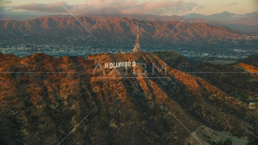 The famous Hollywood Sign at twilight in Los Angeles, California Aerial Stock Photo AX0162_102.0000000 | Axiom Images