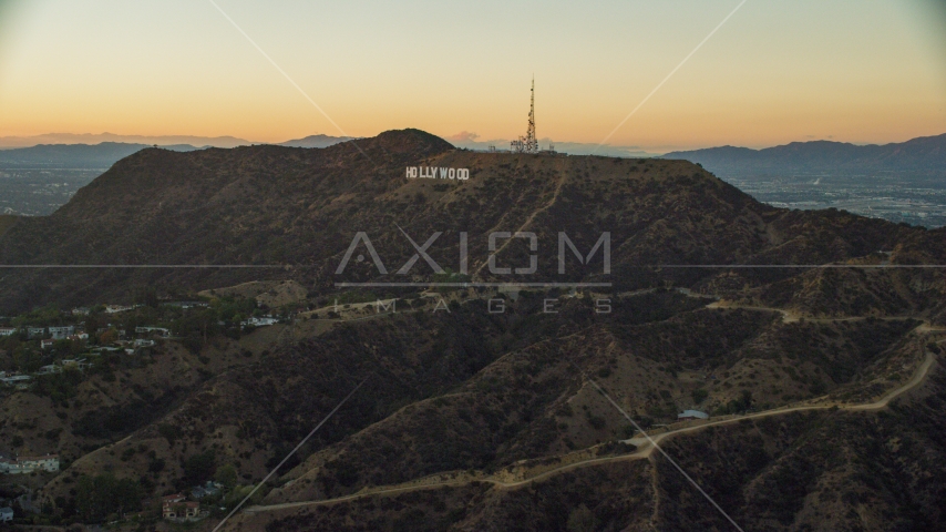 The world famous Hollywood Sign at twilight in Los Angeles, California Aerial Stock Photo AX0162_107.0000000 | Axiom Images