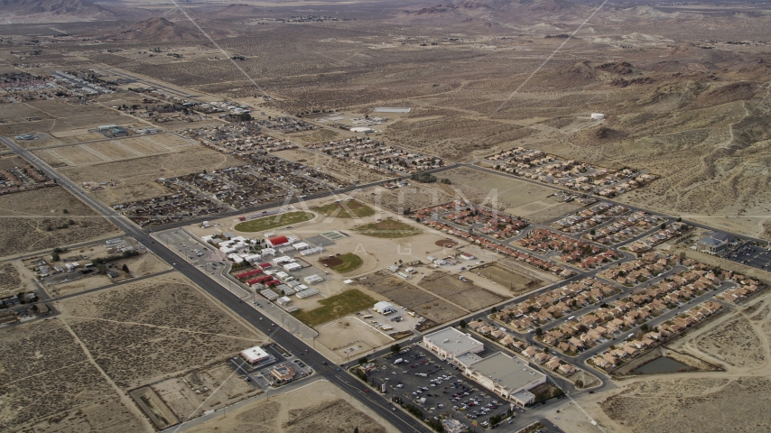 Small neighborhoods in the desert in Rosamond, California Aerial Stock Photo AX06_101.0000099 | Axiom Images