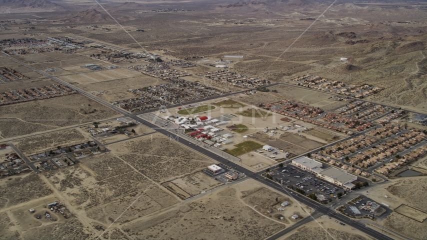 Neighborhoods in a desert town in Rosamond, California Aerial Stock Photo AX06_101.0000199 | Axiom Images