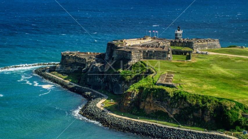 The seaside Fort San Felipe del Morro in Old San Juan, Puerto Rico Aerial Stock Photo AX101_017.0000136F | Axiom Images