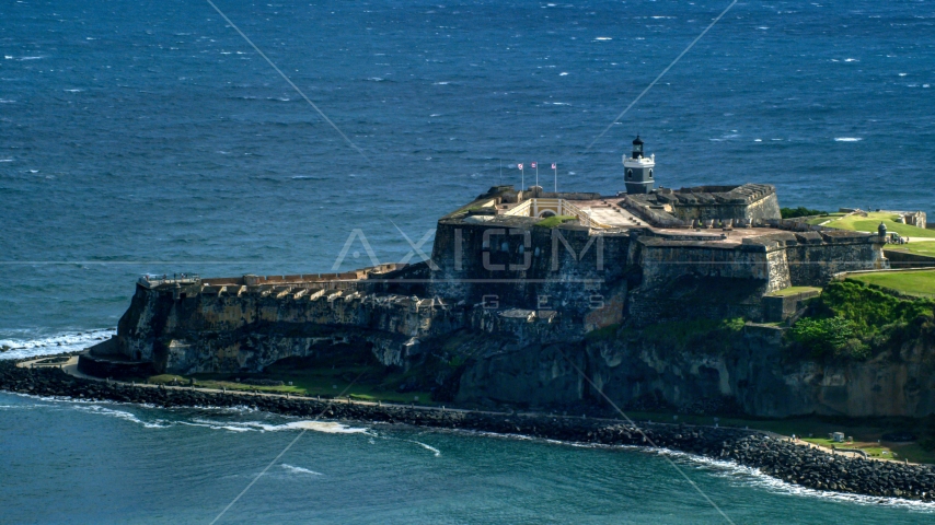 Historic fort on the coast in the blue Caribbean waters, Old San Juan Puerto Rico Aerial Stock Photo AX101_020.0000163F | Axiom Images