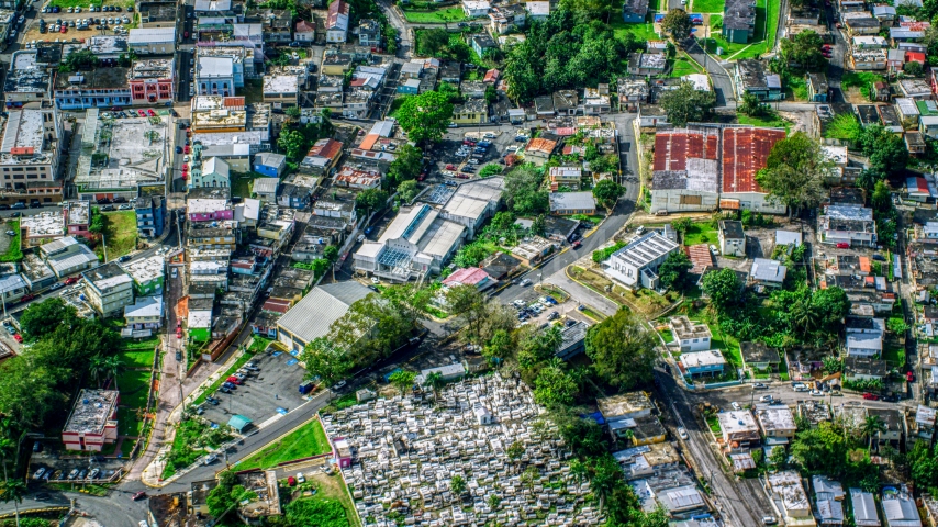 Small town with homes and a cemetary, Ciales, Puerto Rico  Aerial Stock Photo AX101_048.0000084F | Axiom Images