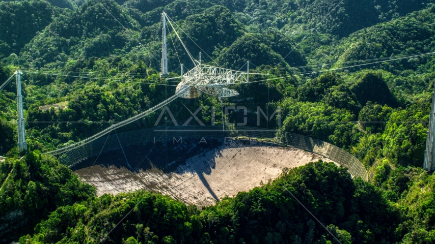 The Arecibo Observatory surrounded by the Karst forest, Puerto Rico Aerial Stock Photo AX101_094.0000000F | Axiom Images