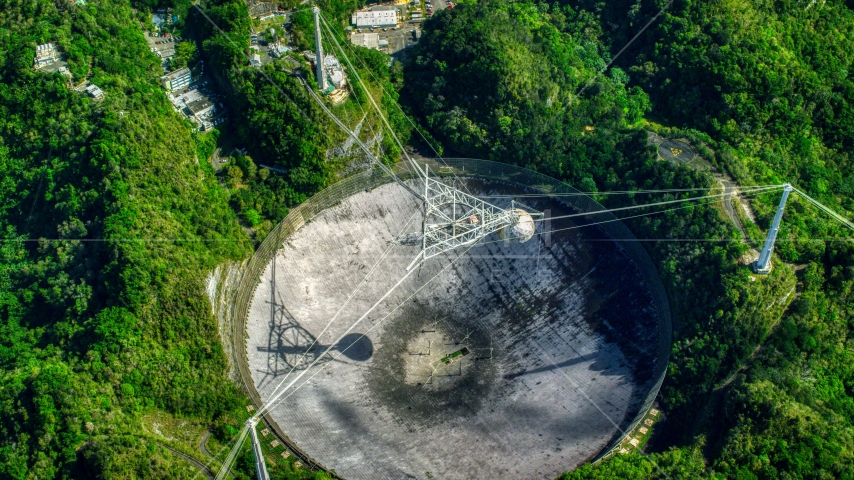 A bird's eye of the Arecibo Observatory in Puerto Rico Aerial Stock Photo AX101_121.0000000F | Axiom Images