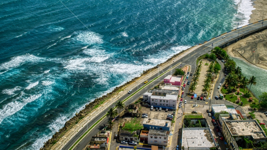 Coastal road, the Avenida Victor Rojas, in Arecibo, Puerto Rico Aerial Stock Photo AX101_139.0000000F | Axiom Images