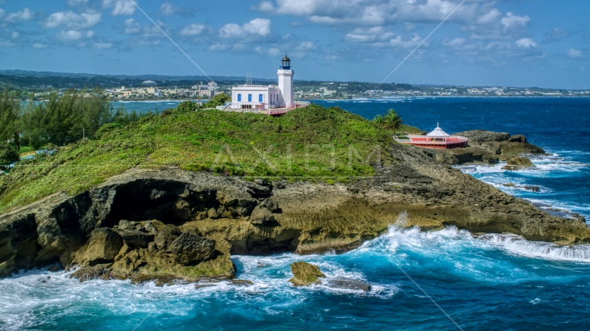 Arecibo Lighthouse on the Caribbean island coast, Puerto Rico  Aerial Stock Photo AX101_147.0000000F | Axiom Images