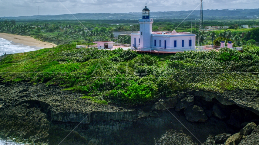 The hilltop Arecibo Lighthouse in Puerto Rico  Aerial Stock Photo AX101_149.0000000F | Axiom Images