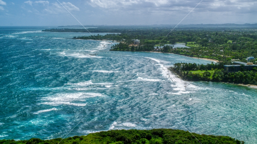 Blue ocean and Caribbean island coastline in Vega Alta, Puerto Rico  Aerial Stock Photo AX101_212.0000205F | Axiom Images