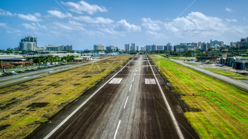 The runway of the Isla Grande Airport, on the Caribbean island of Puerto Rico Aerial Stock Photo AX101_238.0000291F | Axiom Images