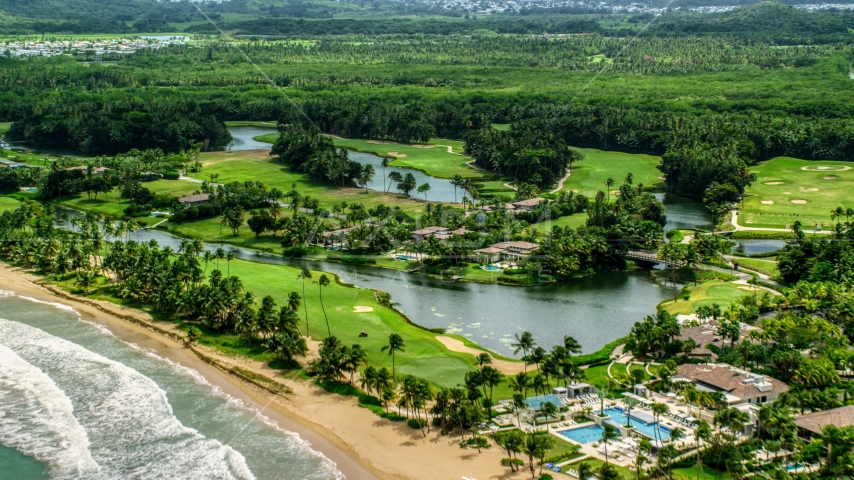 Caribbean beachfront resort in Rio Grande, Puerto Rico  Aerial Stock Photo AX102_040.0000127F | Axiom Images