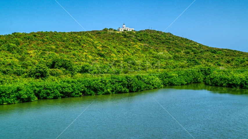 Cape San Juan Light, a hilltop lighthouse in Puerto Rico  Aerial Stock Photo AX102_062.0000000F | Axiom Images