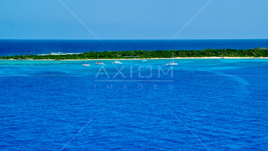 Catamarans near an island in tropical blue waters, Rada Fajardo, Puerto Rico Aerial Stock Photo AX102_073.0000000F | Axiom Images