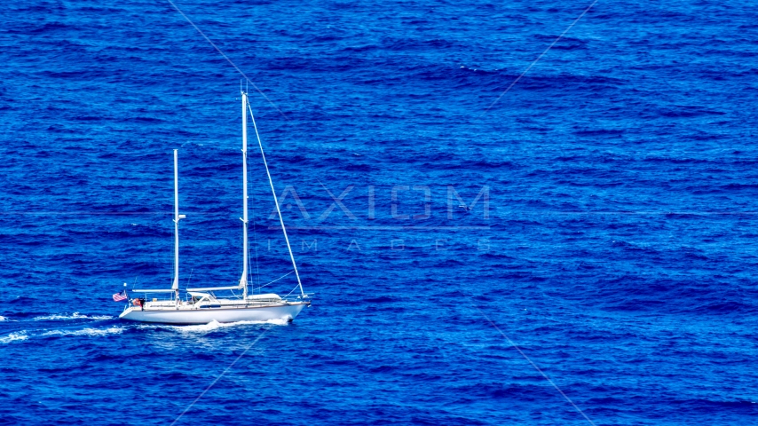 Sail boat in sapphire blue waters, Culebra, Puerto Rico  Aerial Stock Photo AX102_106.0000000F | Axiom Images