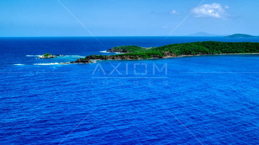 Rugged Caribbean island coastline in sapphire blue water, Culebra, Puerto Rico  Aerial Stock Photo AX102_107.0000000F | Axiom Images