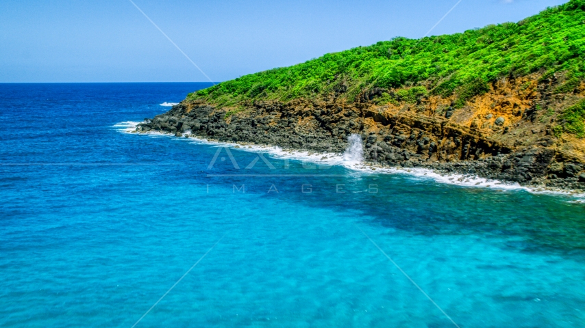 Sapphire blue waters on the rocky coast of Culebra, Puerto Rico Aerial Stock Photo AX102_119.0000000F | Axiom Images